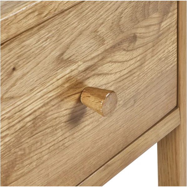 Close-up of the Coxmoor 1 Draw Bedside table showing wood grain texture and a single tapered wooden drawer knob.
