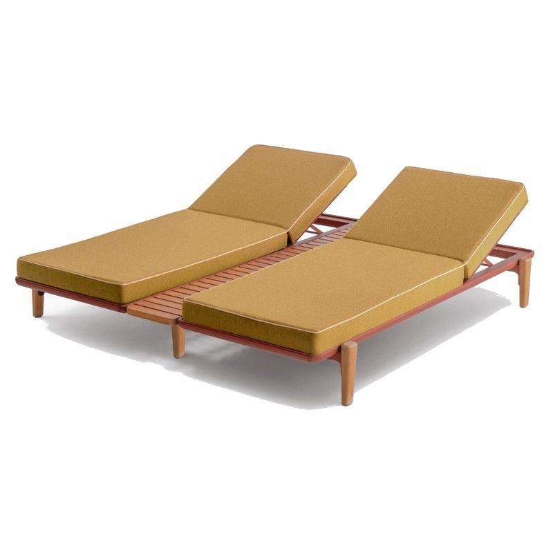 Fibra XL double sun lounger featuring ochre upholstered cushions, rust-toned metal frames, and wood accents.