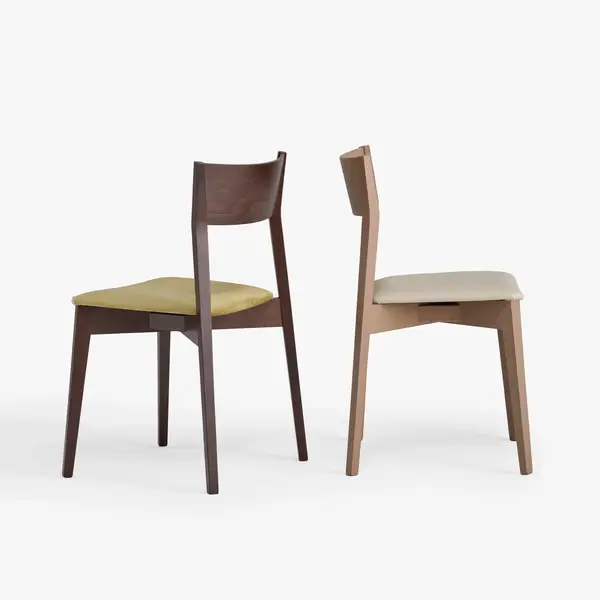 Pair of Miss Side Chairs displaying contrasting wood finishes and upholstered seats against a clean white studio backdrop.