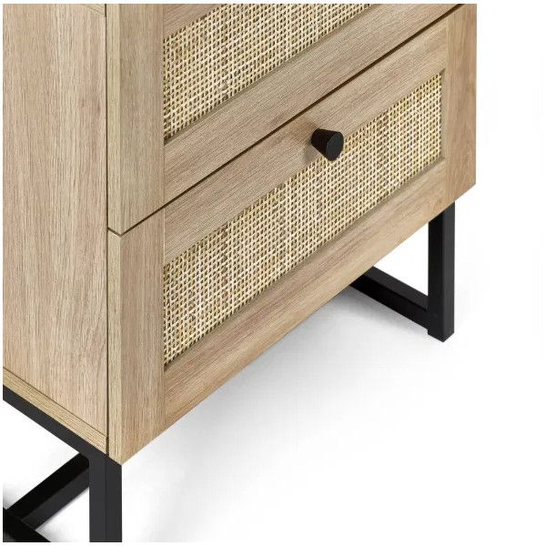 Close-up of the Padstow bedside unit highlighting the wood grain finish, rattan drawer textures, and black metal base.
