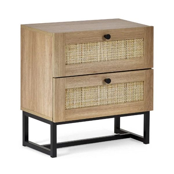 Padstow bedside table in a light wood finish, featuring two drawers with rattan weave fronts and black hardware.