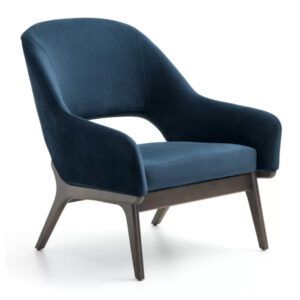 Oslo Lounge Chair in navy blue upholstery with curved back and wooden four-legged frame, angled side view