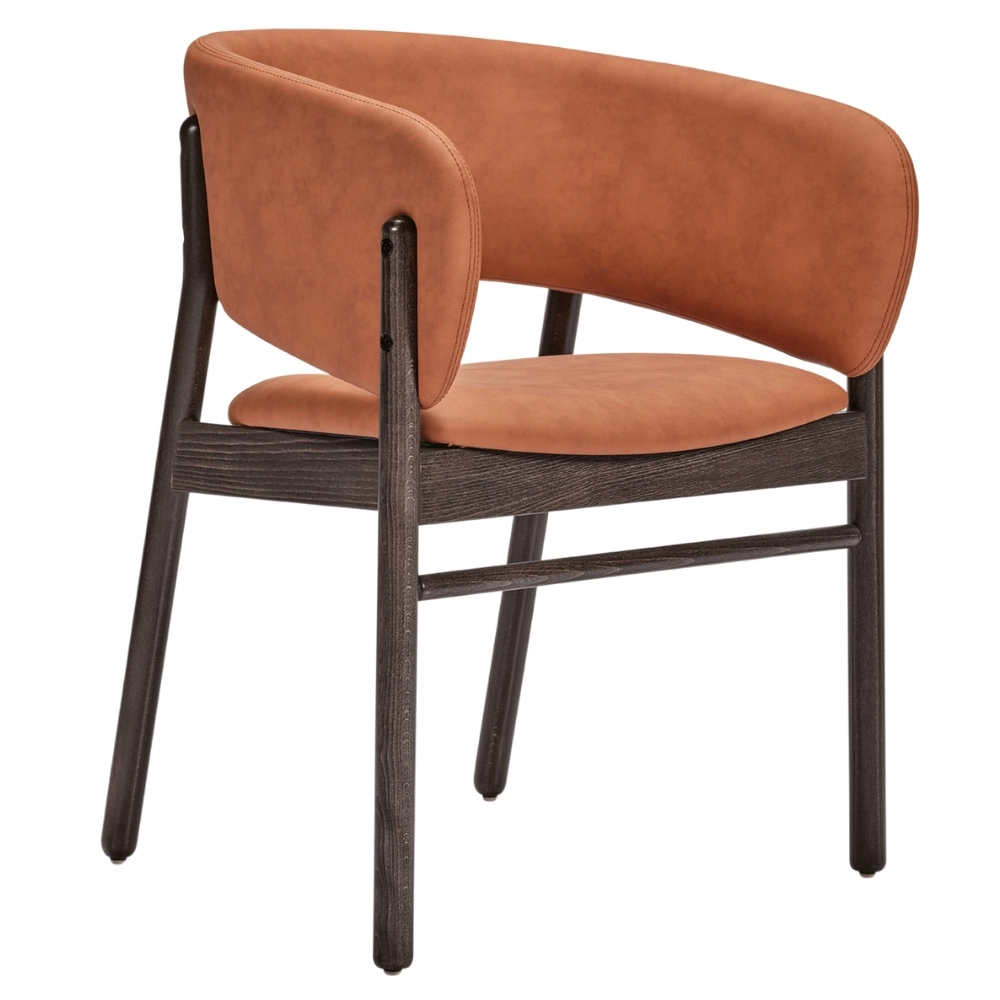 Camille S armchair rear view, tan upholstered curved back and seat on dark wooden four-legged frame