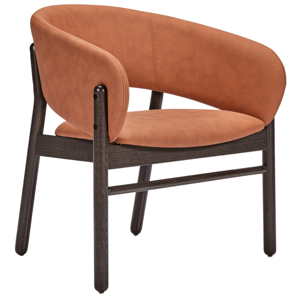 Camille S Lounge Chair with tan upholstered curved seat and backrest on a dark wooden four-legged frame, angled rear view