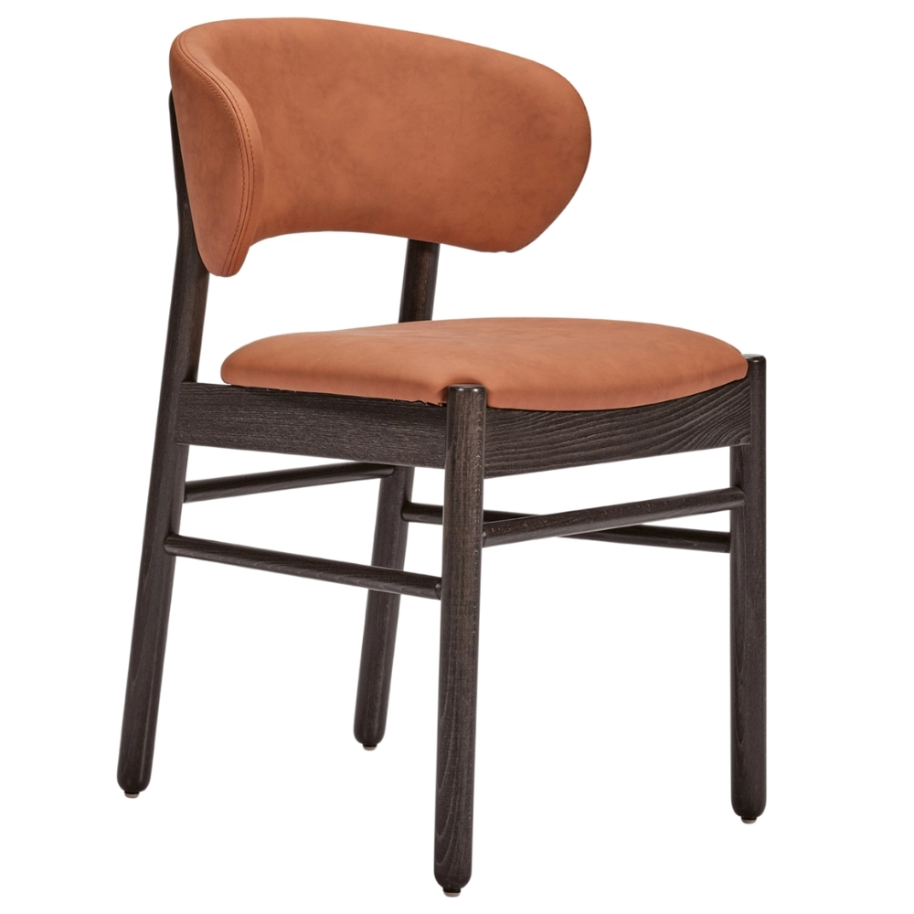 Camille S Side Chair in tan leather upholstery with curved back and dark wood four-legged frame, angled view